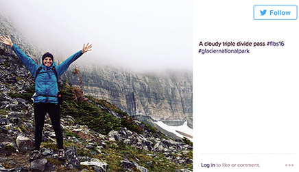 Ecology student at the top of Triple Divide Pass in Glacier National Park